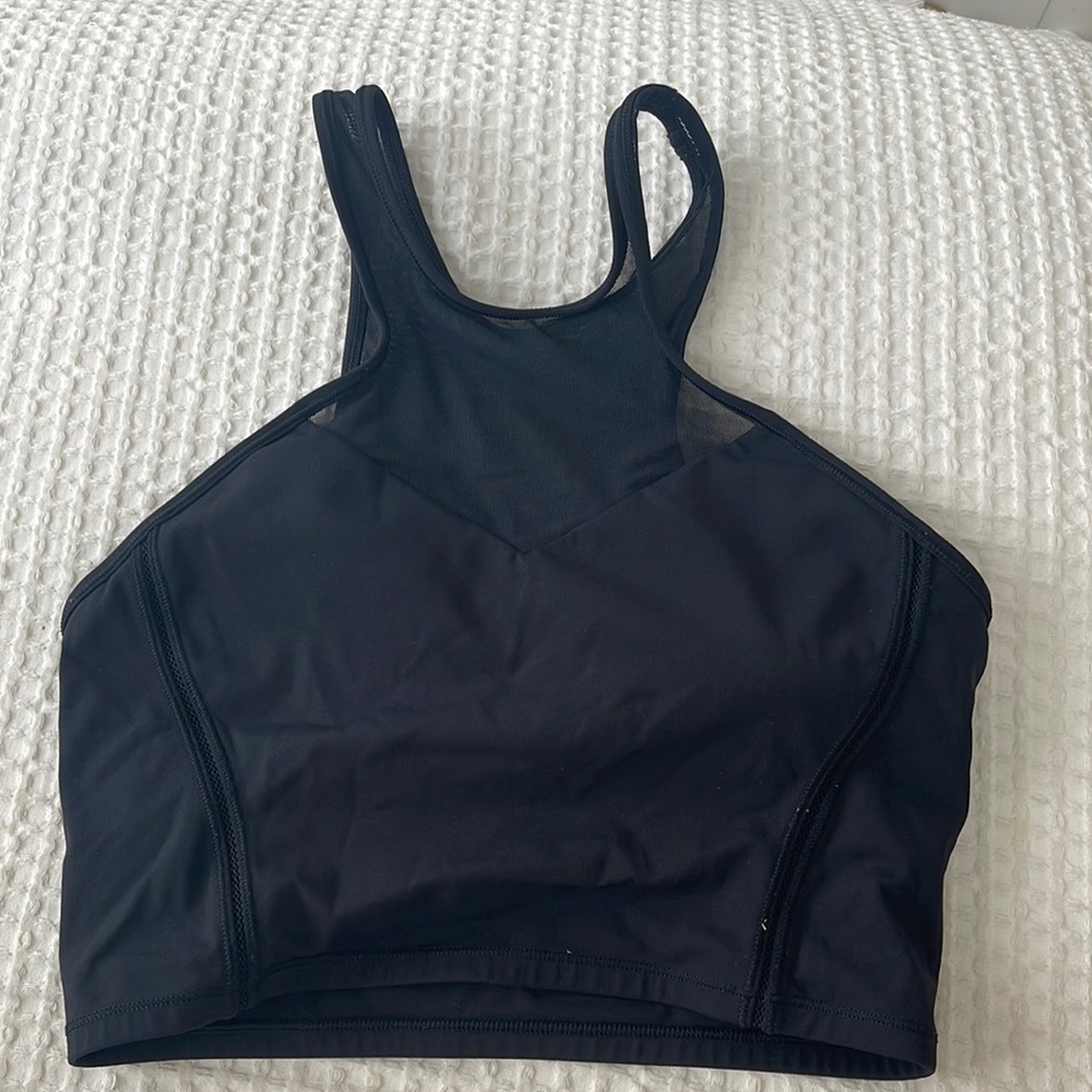 Lululemon black sports bra top with mesh detail. Size 8